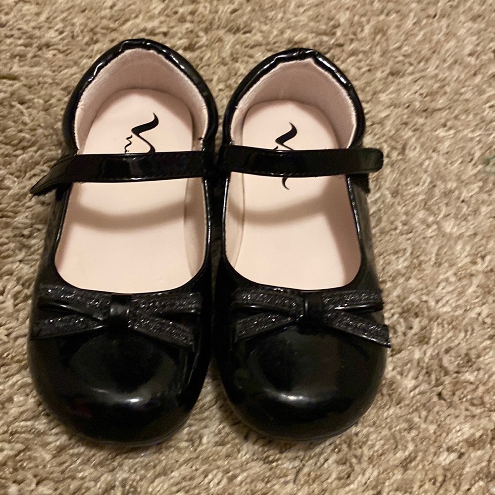 Girls Nina black dress shoes.